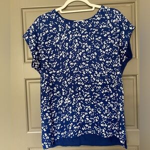 Blue blouse with white flowers